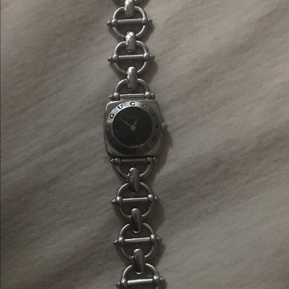 Authentic Gucci Silver with Black face watch